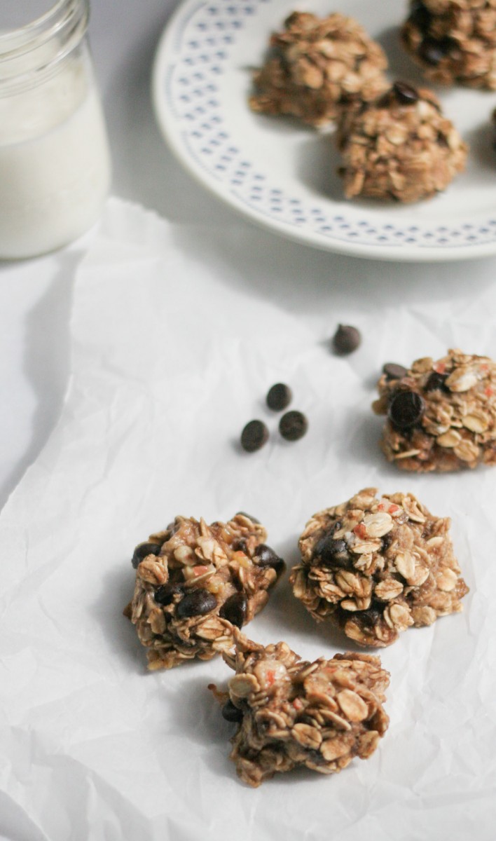 Healthy 3-Ingredient Sweet and Salty Oat Cookies on a white table with a glass of milk