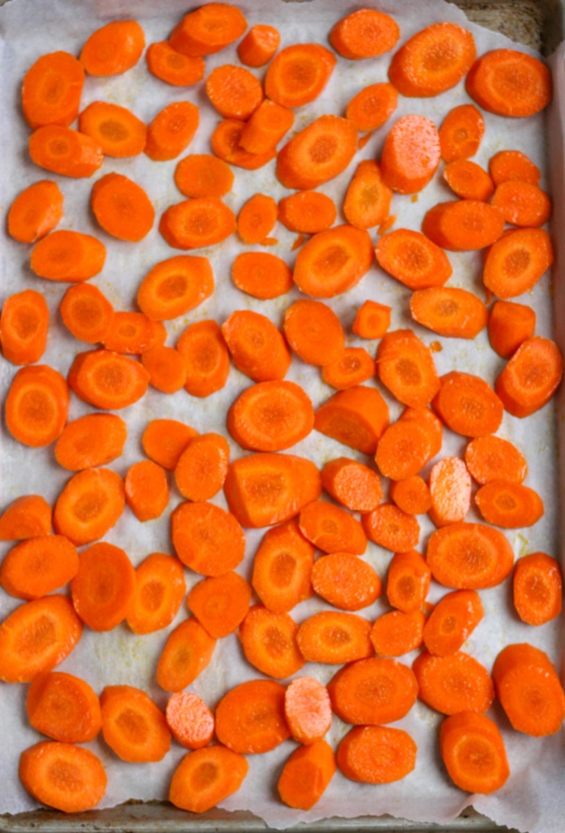 Sliced carrots on a baking sheet