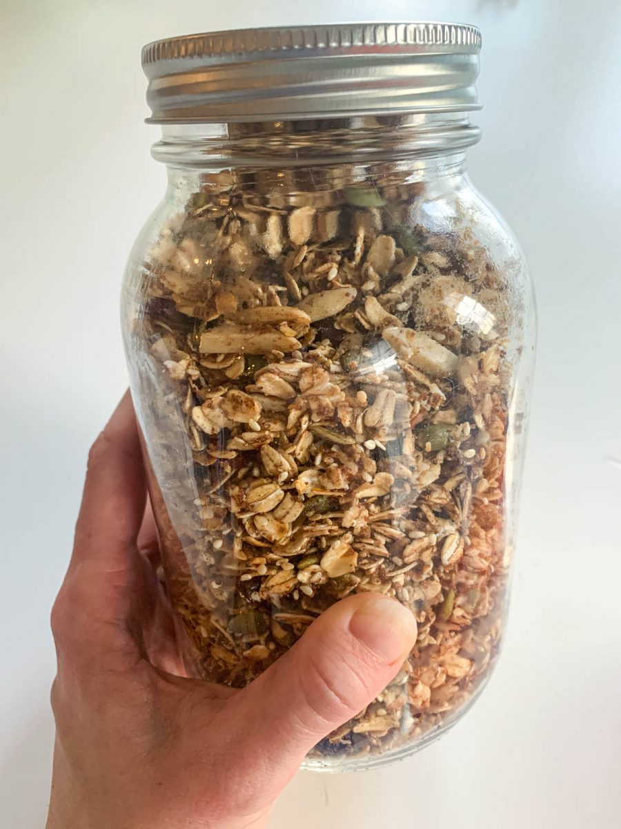 A large mason jar filled with healthy granola