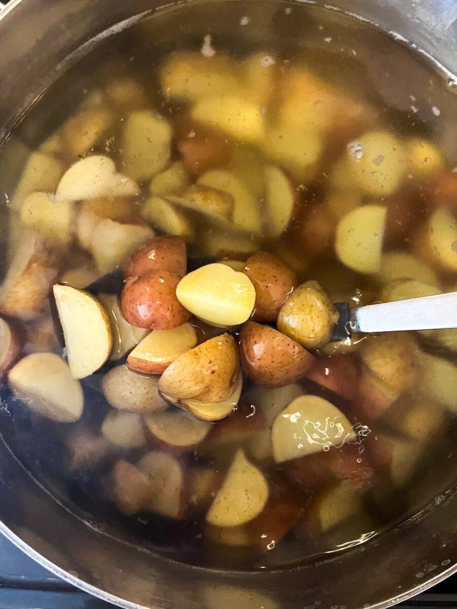 Potatoes in a large pot of water.