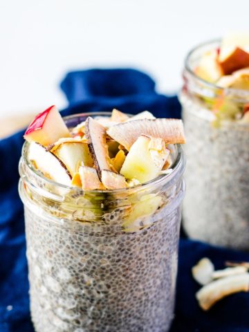 Chia seed Pudding in a small mason jar topped with apples