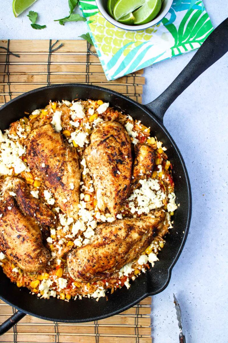 Chicken breasts and rice cooked in a Cast Iron Skillet