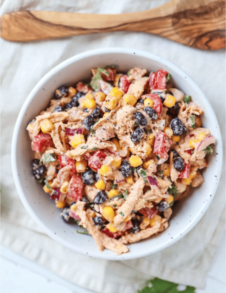 Creamy Chicken, Black Bean & Corn Salad in a white bowl.
