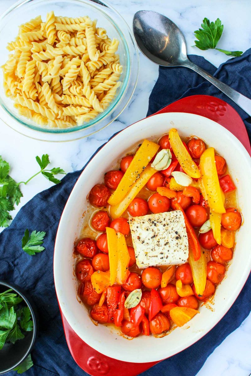 Feta and Cherry Tomatoes in a red baking dish