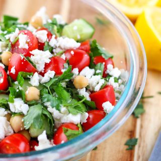 Fresh Herb Salad with Chickpeas and Feta in a clear bowl