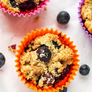 Gluten-Free Blueberry Muffins on a white countertop