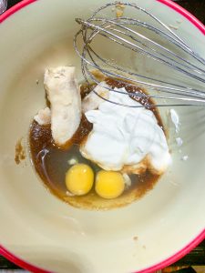 Mixing bowl with bananas, eggs, greek yogurt for mixing