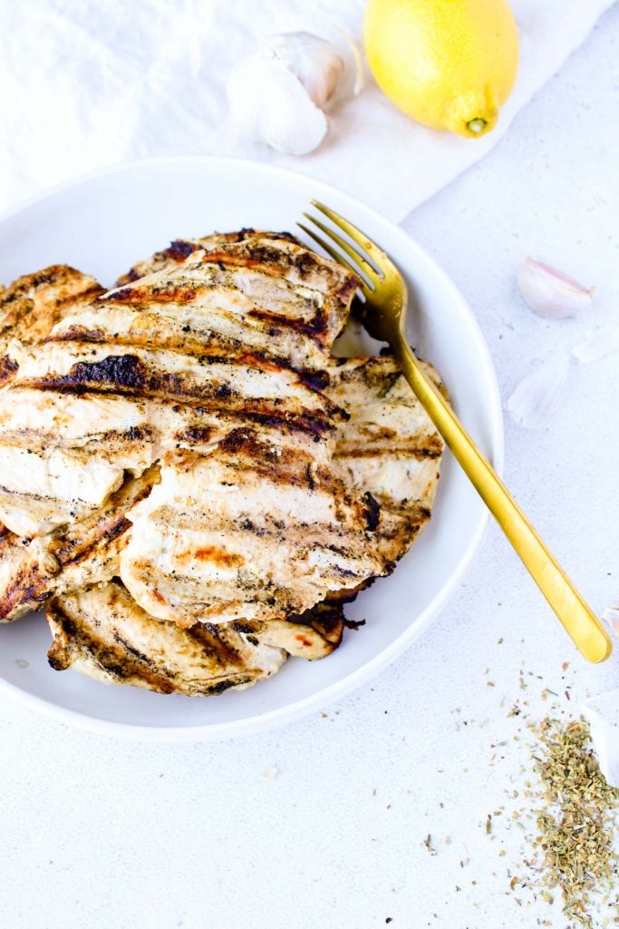 Grilled chicken in a white bowl