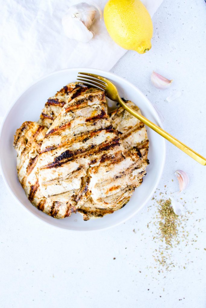 Grilled chicken in a white bowl
