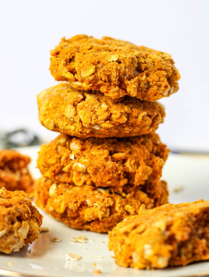 A stack of pumpkin scones on a white plate