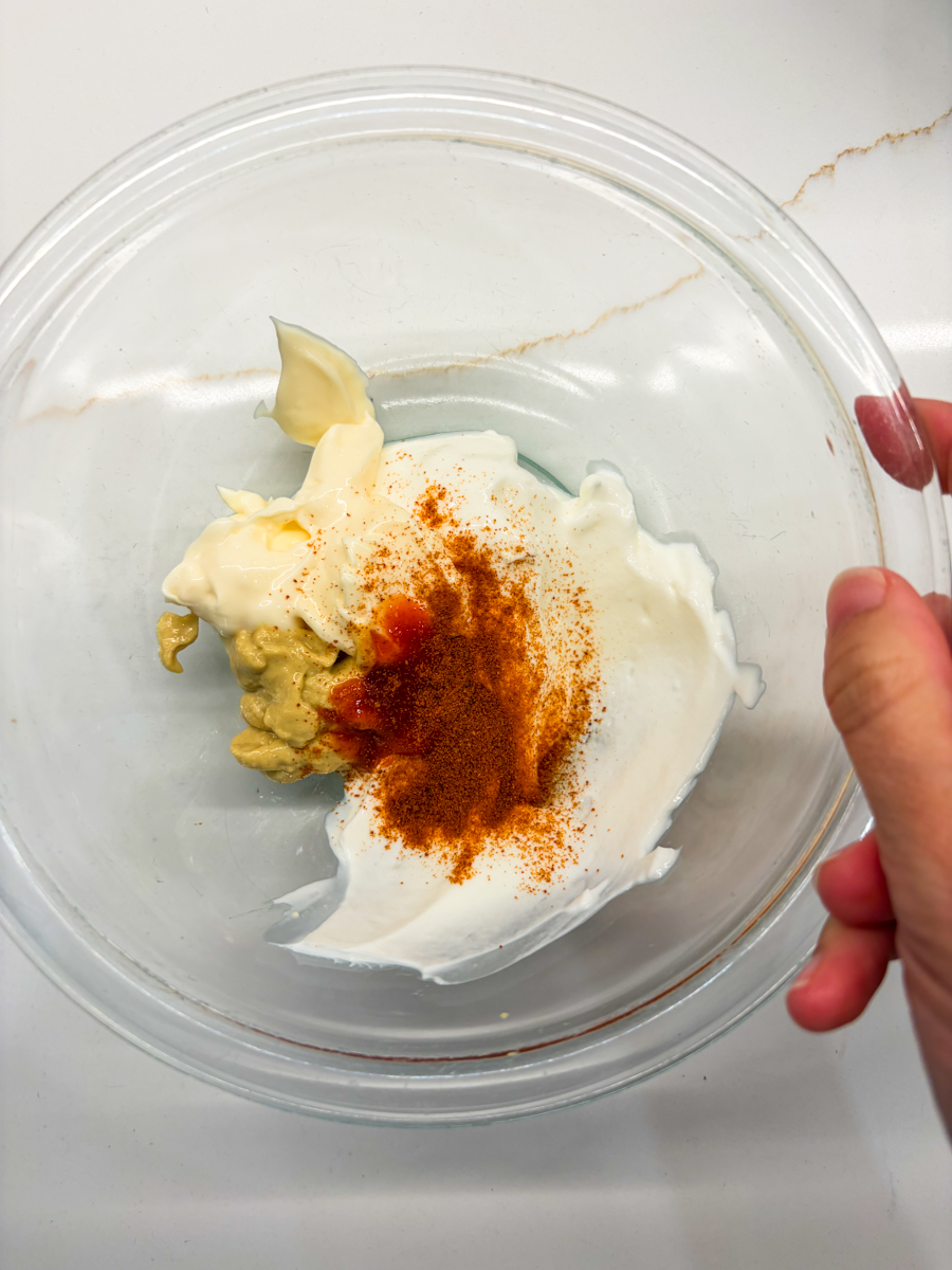 Mix dressing ingredients together.