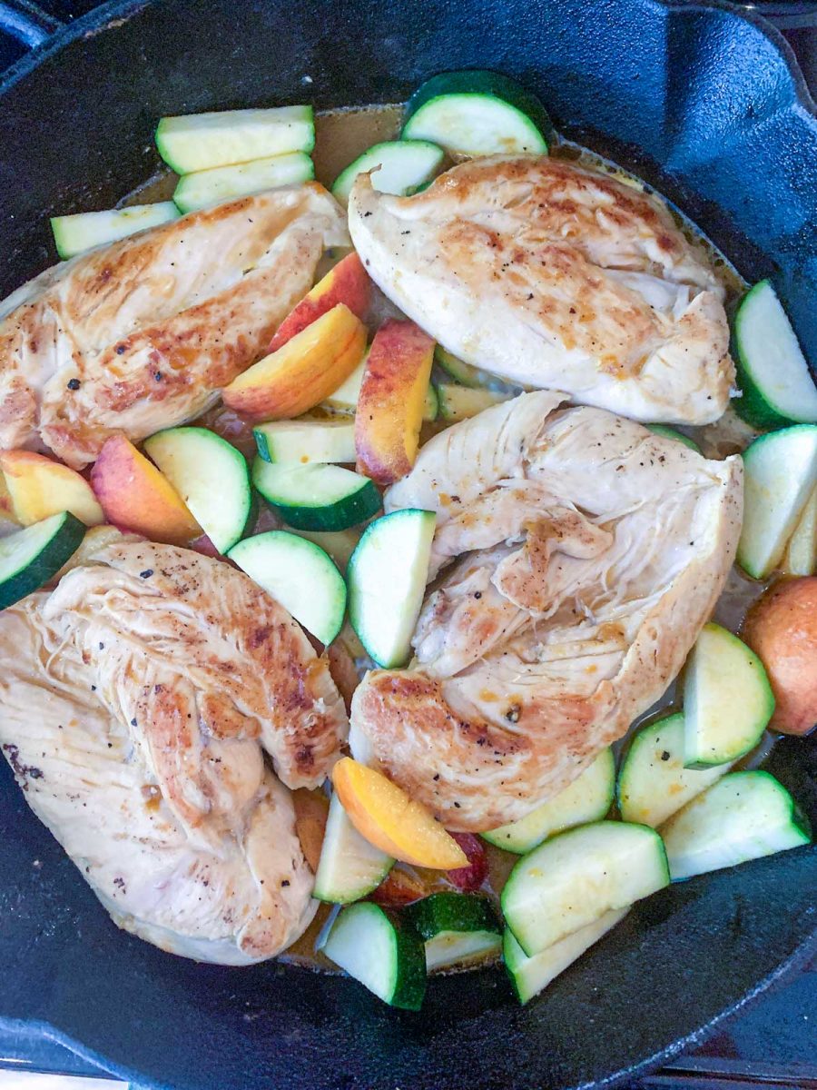 Add cut zucchini and peaches to the pan.