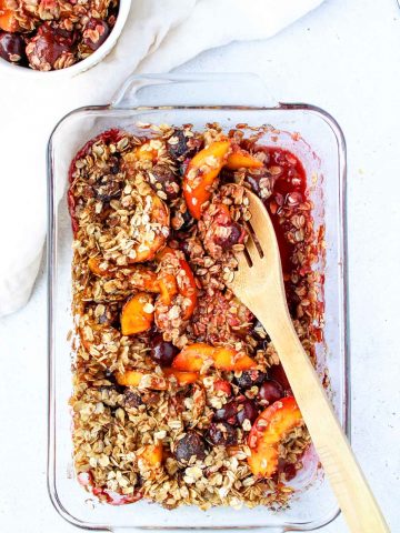 Pan of Healthy Cherry and Peach Crisp with Oat Crumble.