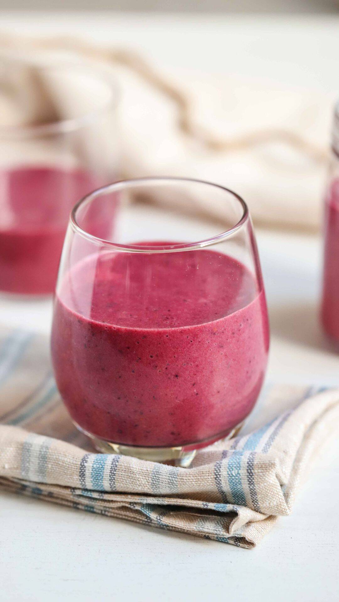 A glass of raspberry Beet Protein Smoothie.