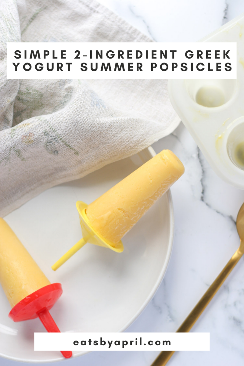 Simple 2-Ingredient Greek Yogurt Summer Popsicle on a white plate beside a gold spoon