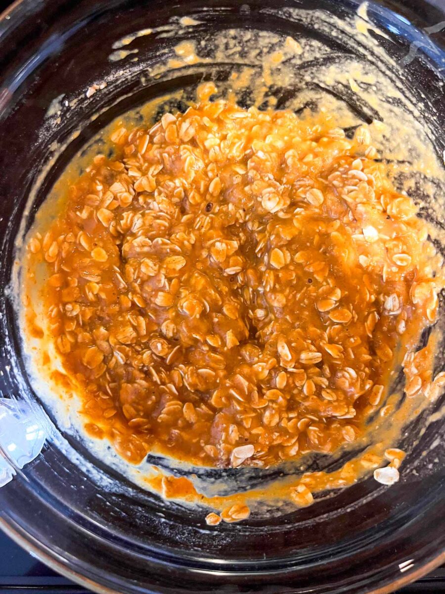 Pumpkin baked oats batter in a small bowl.