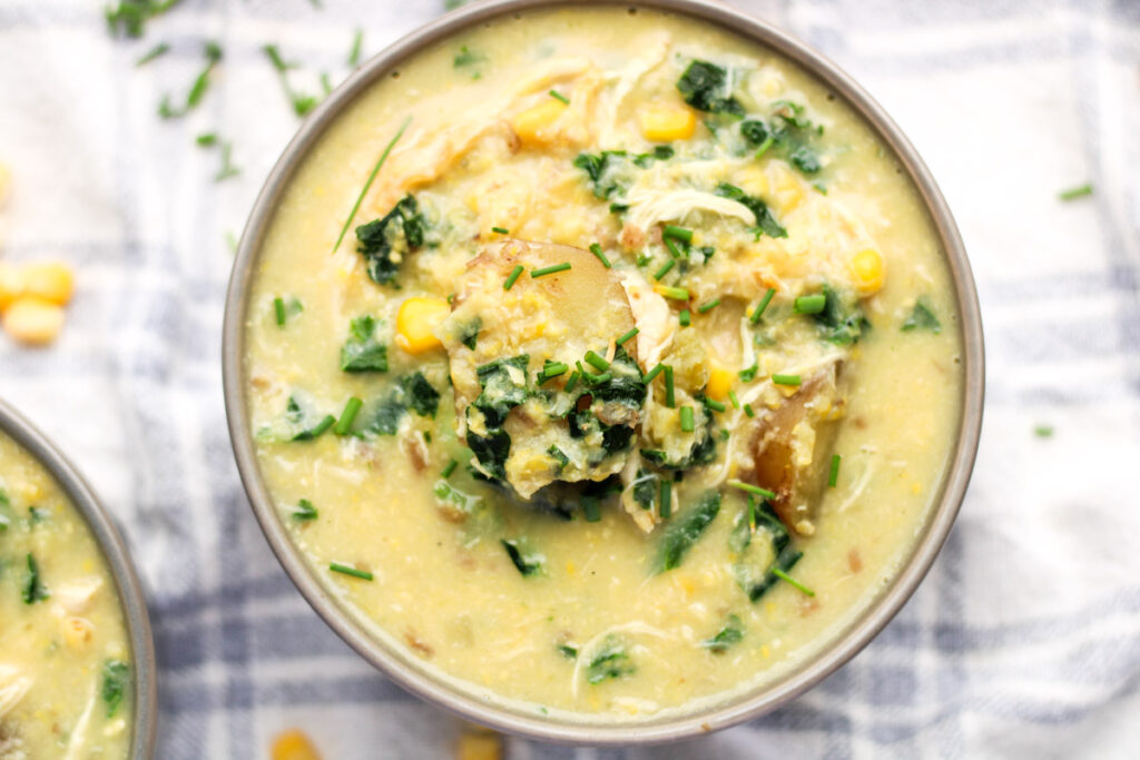 Bowl of corn and chicken soup.