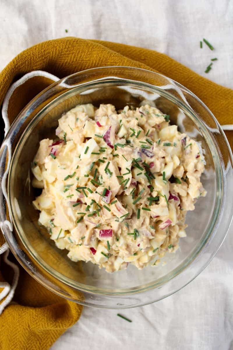 Tuna and egg salad high protein in a glass bowl.