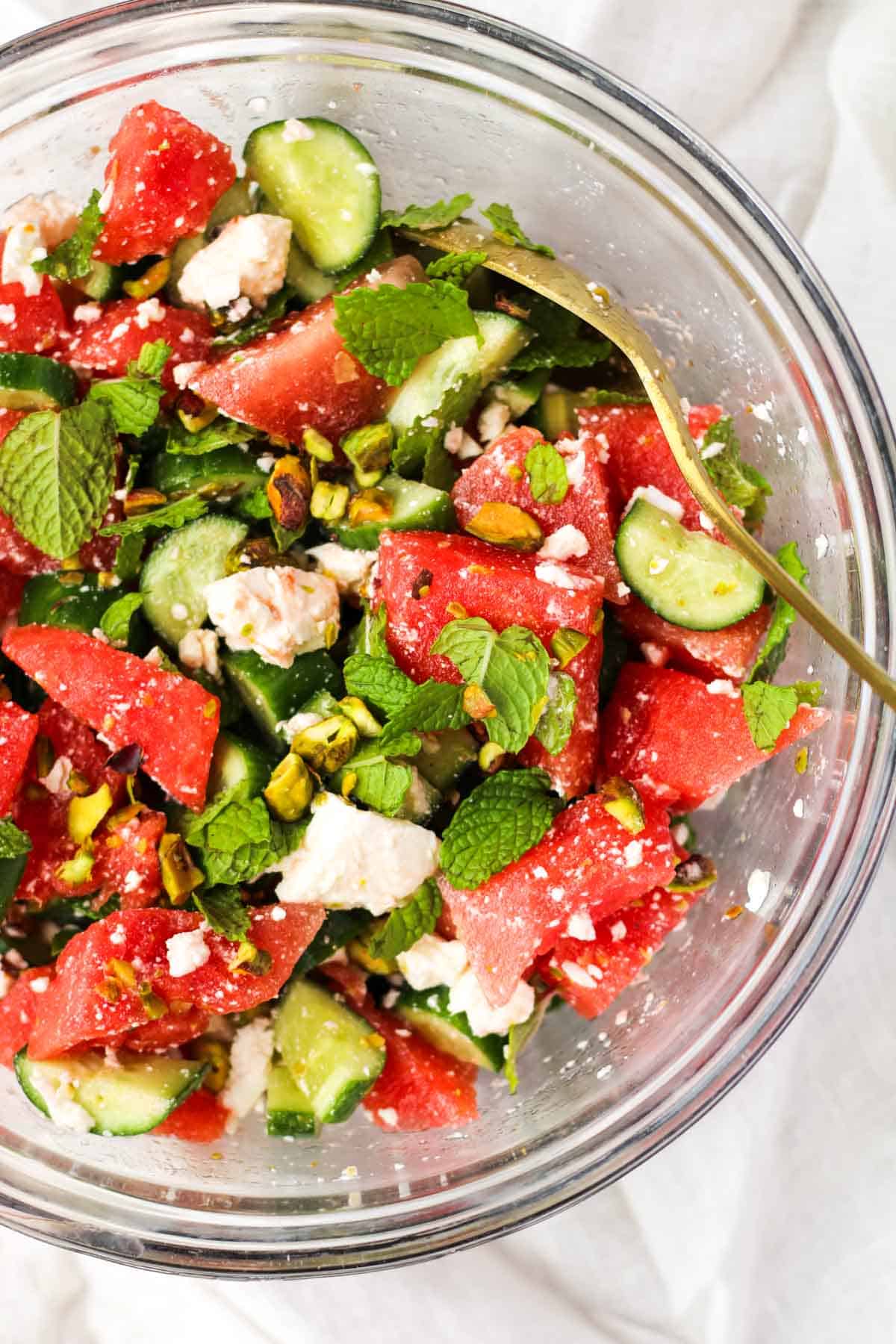 Watermelon Feta Mint salad in a glass bowl.