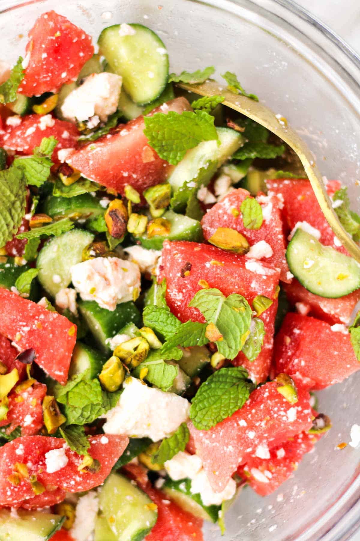 Watermelon Feta Mint salad in a glass bowl.