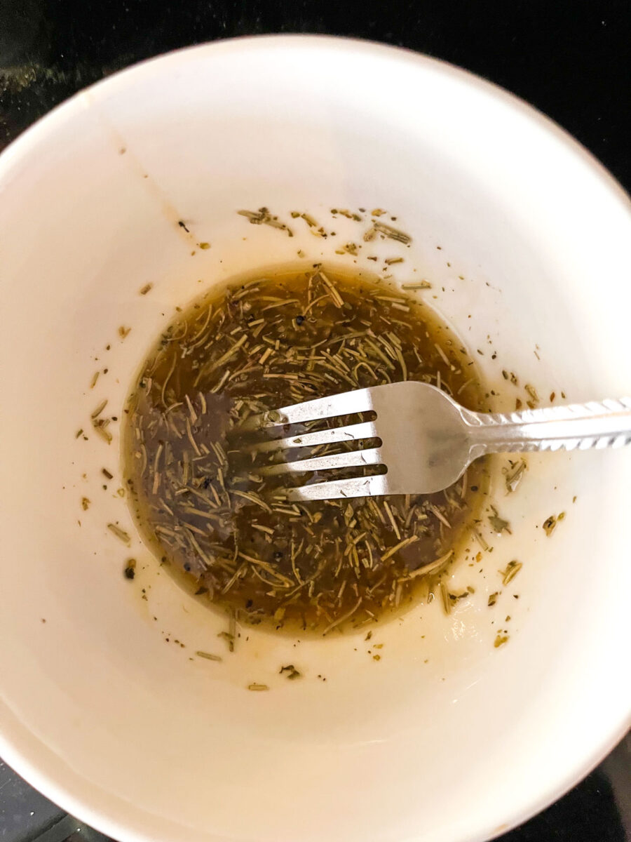 Melted butter with dried herbs whisked in.