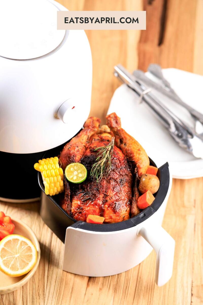 Air fryer with chicken.