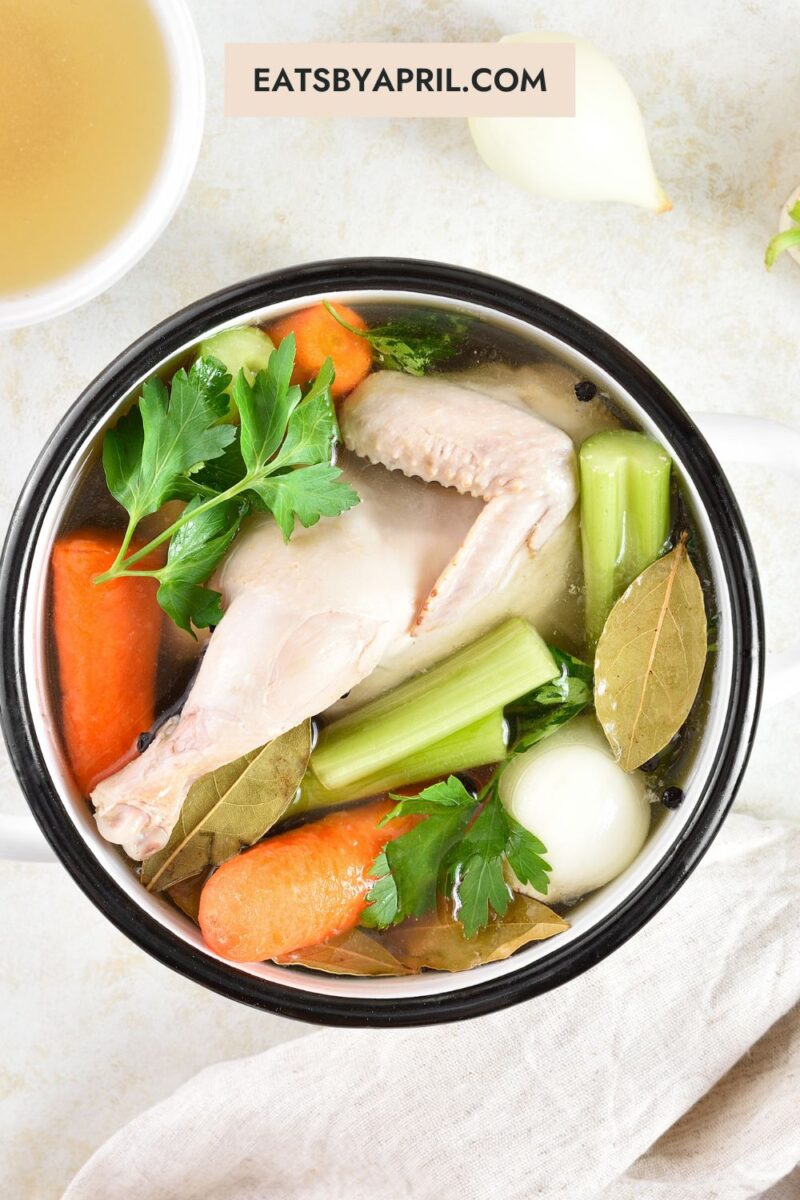 chicken broth ingredients in a pot.